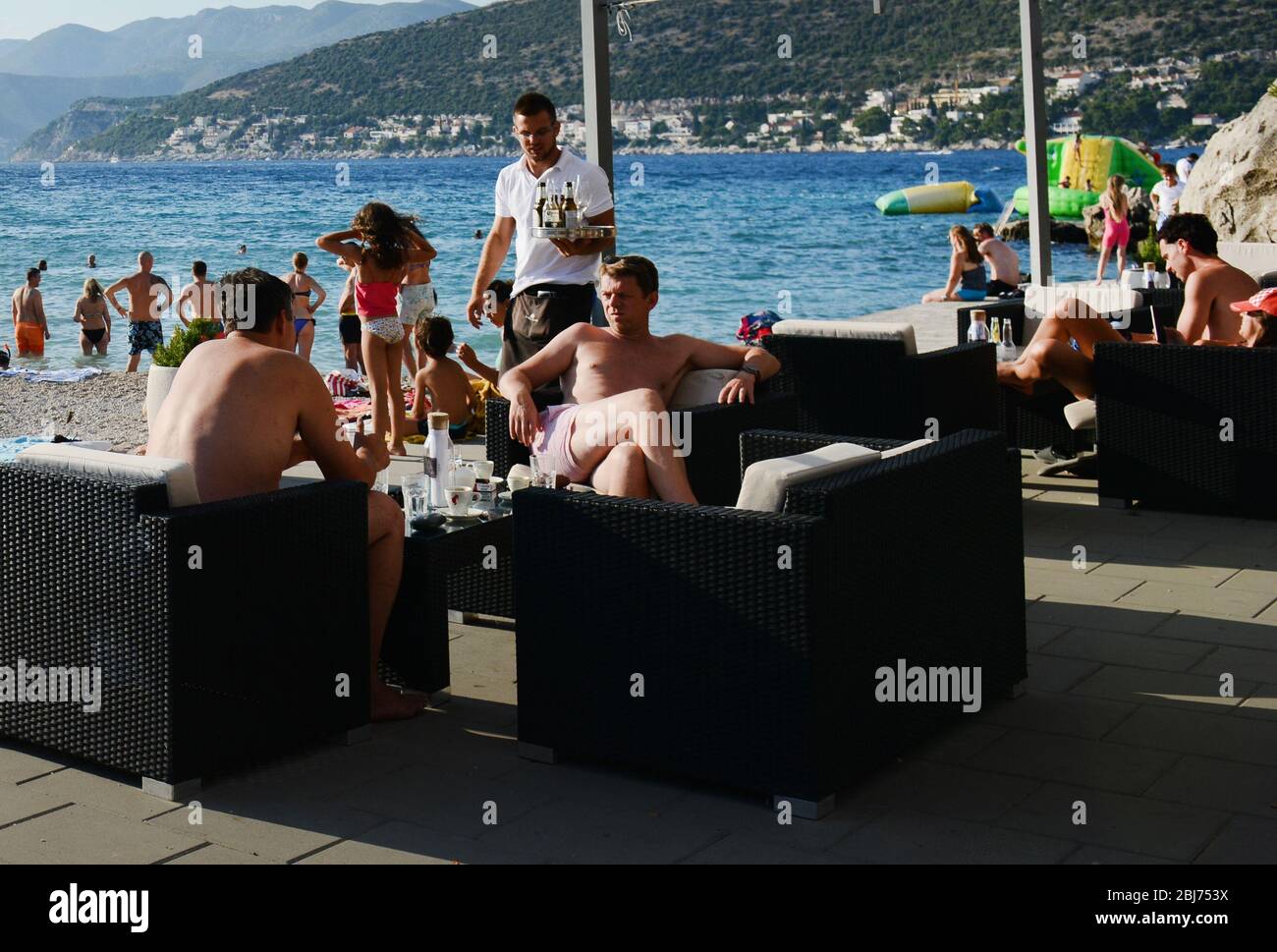 Chilling out on the beach in Dubrovnik, Croatia. Stock Photo