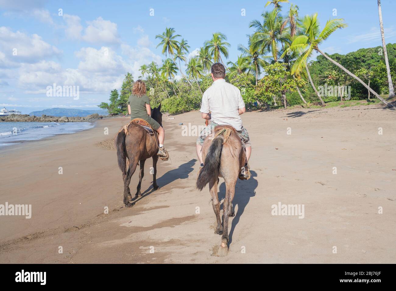 Horseback riding on beach, Drake Bay, Corcovado National Park, Osa