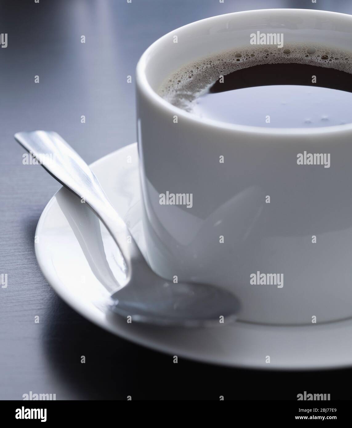 Cup of coffee on restaurant table Stock Photo