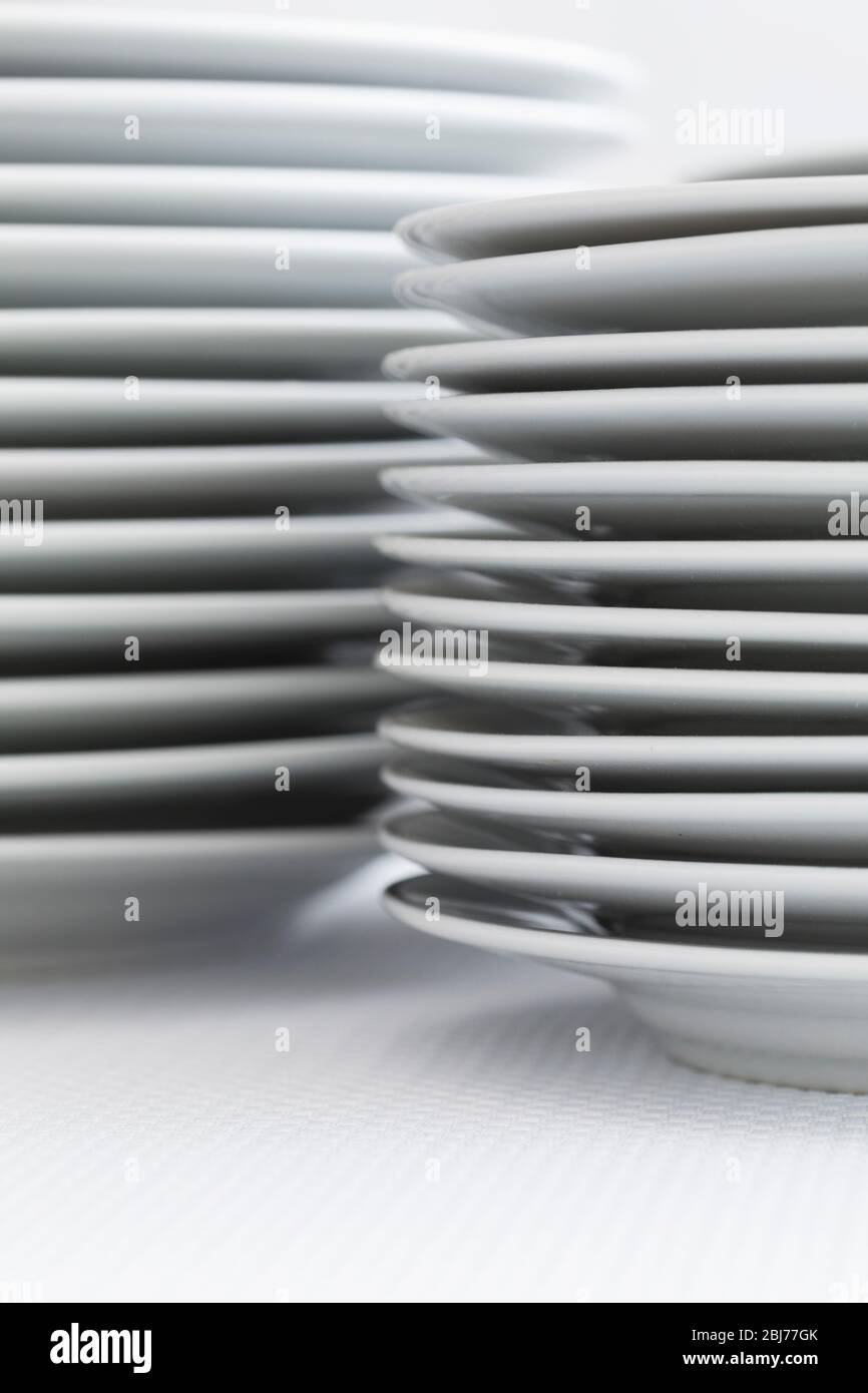 White plates on linen Stock Photo