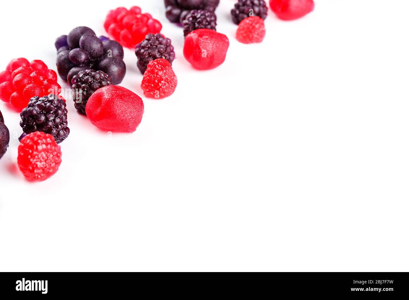Fruit candies isolated on white Stock Photo - Alamy