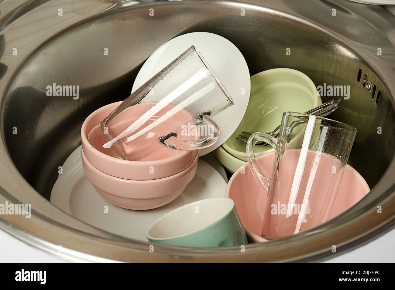 Dirty dishes in kitchen sink closeup Stock Photo
