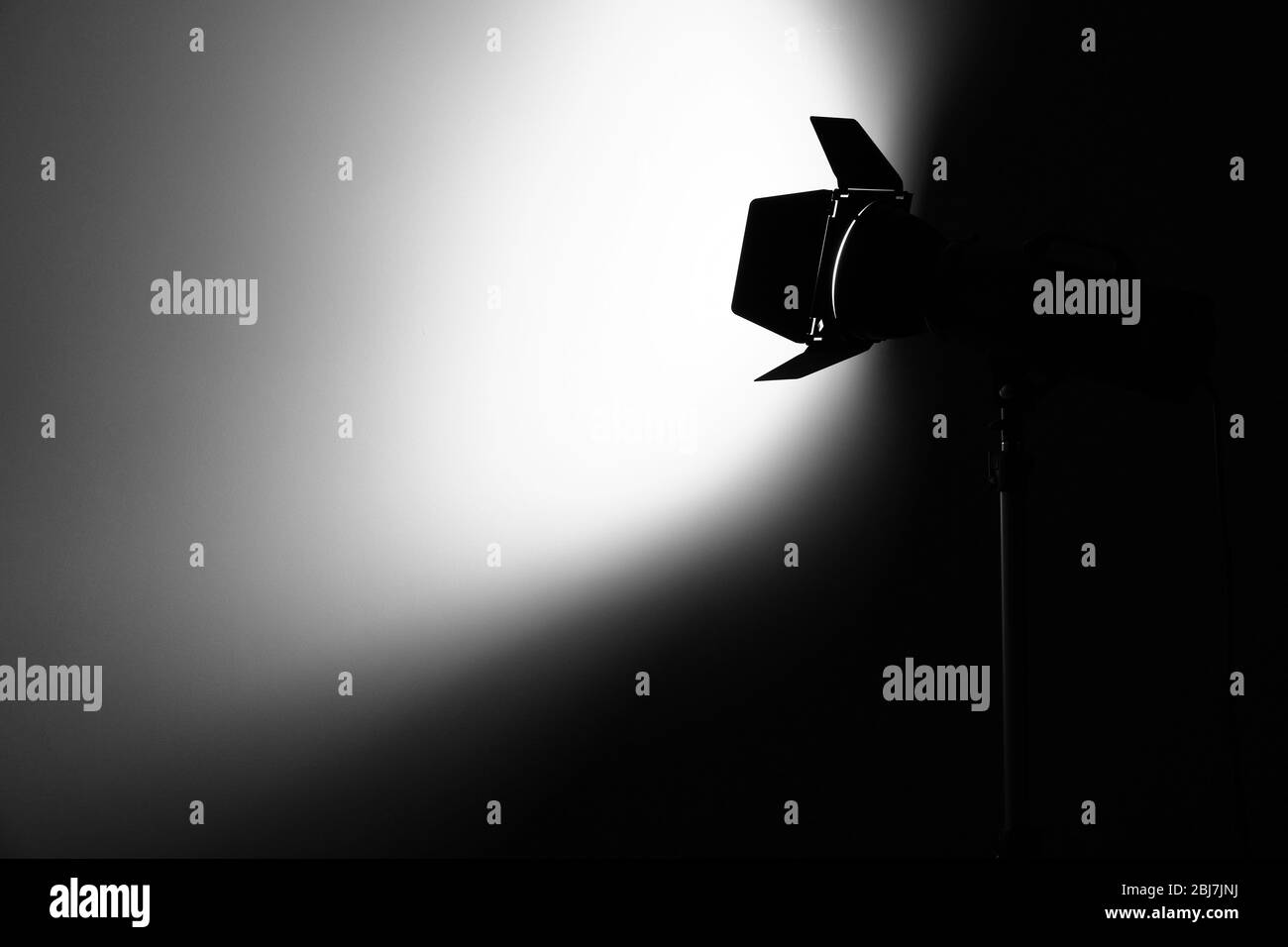 Studio light flash in dark Stock Photo Alamy