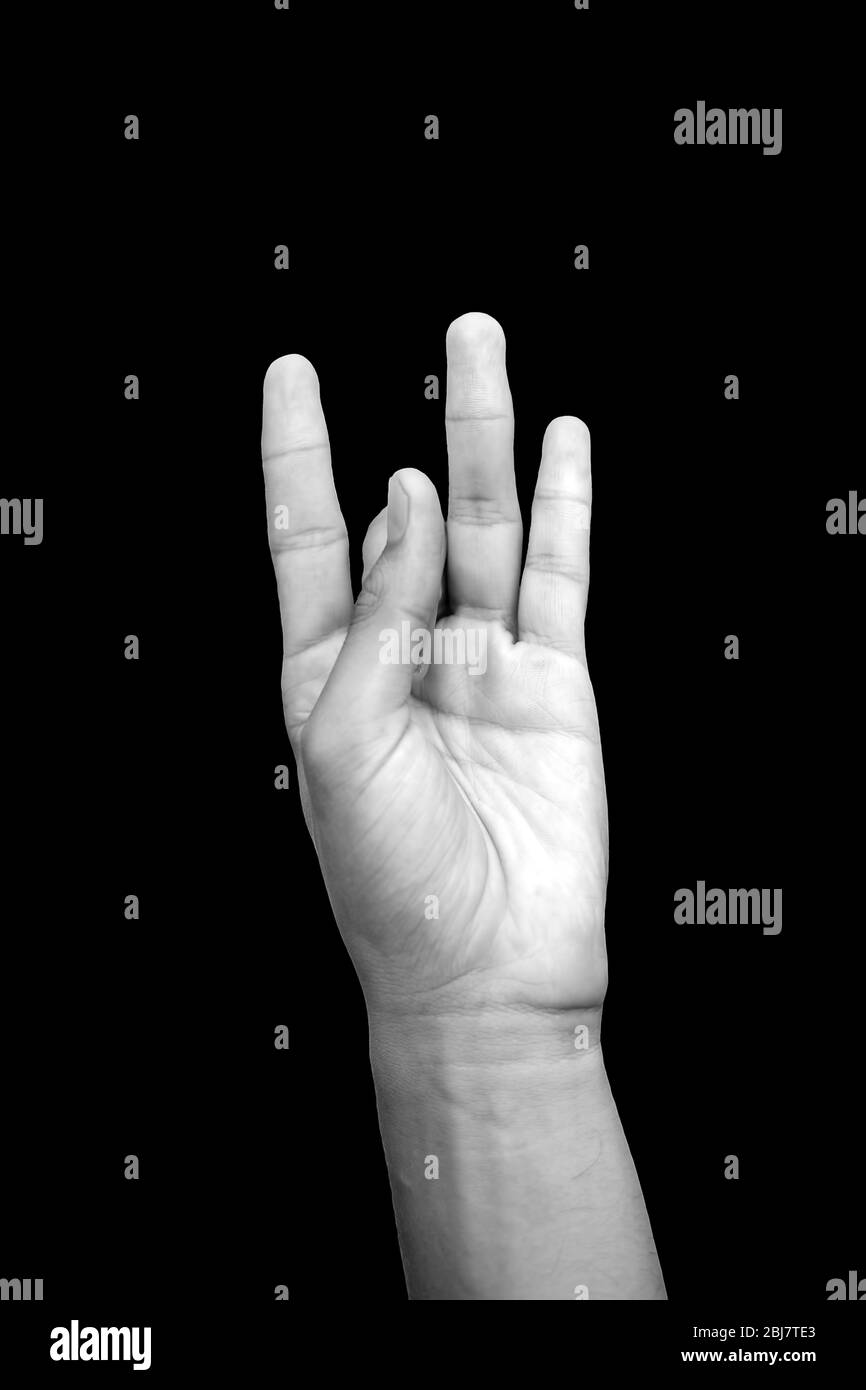 Isolated Hands Of A Male Doing Shunya Mudra Or Mudra Of Emptiness On A Black Colored Background Studio Shot Stock Photo Alamy
