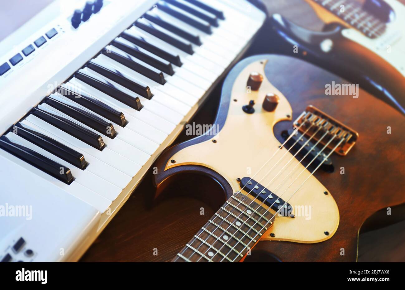 Electric guitars and synthesizer closeup Stock Photo Alamy