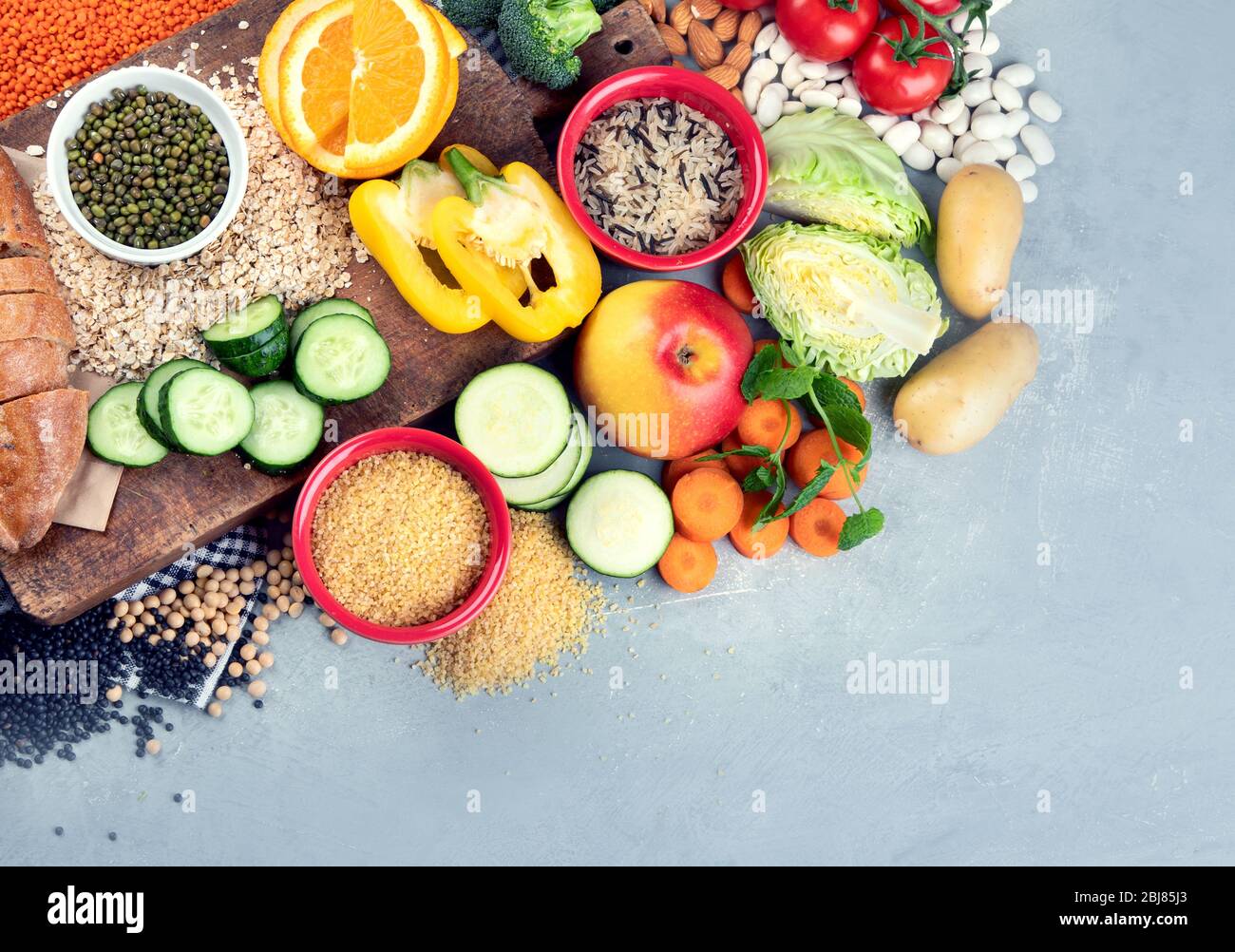 Foods high in carbohydrates on grey background. Vegan Foods high in