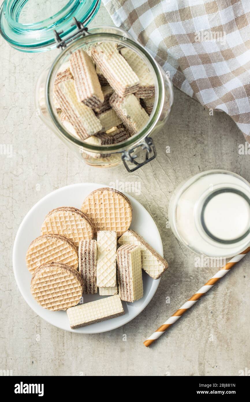 Sweet wafer biscuits on plate. Top view. Stock Photo