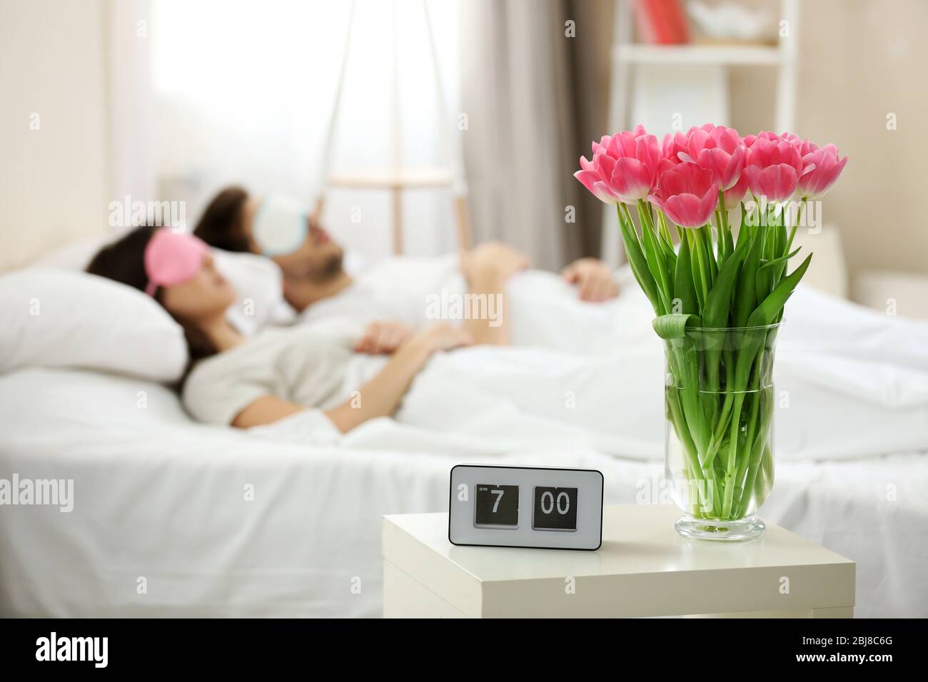 Young cute couple sleeping in eye masks Stock Photo Alamy