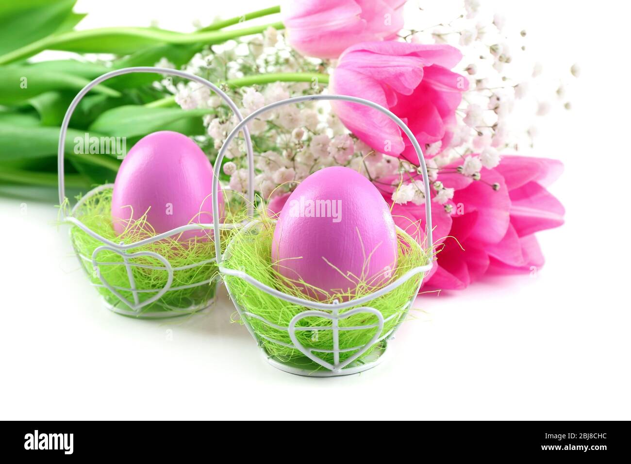 Easter eggs and tulips isolated on white Stock Photo - Alamy