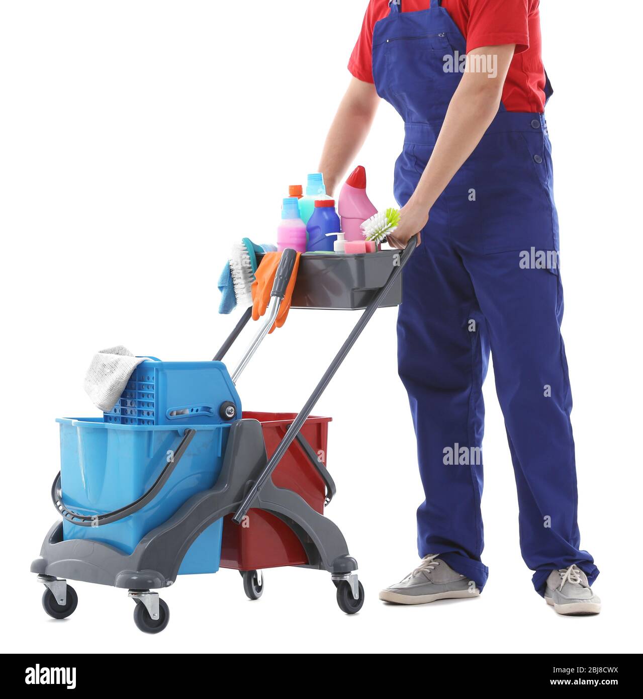 Young janitor with cleaner cart, isolated on white Stock Photo Alamy