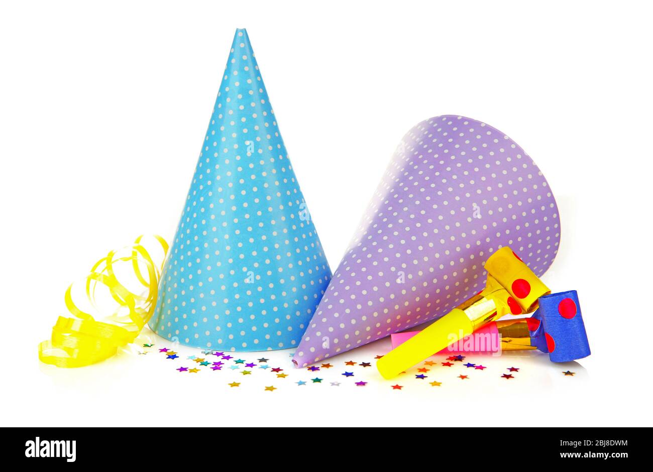 Party hats with blowers, isolated on white Stock Photo - Alamy