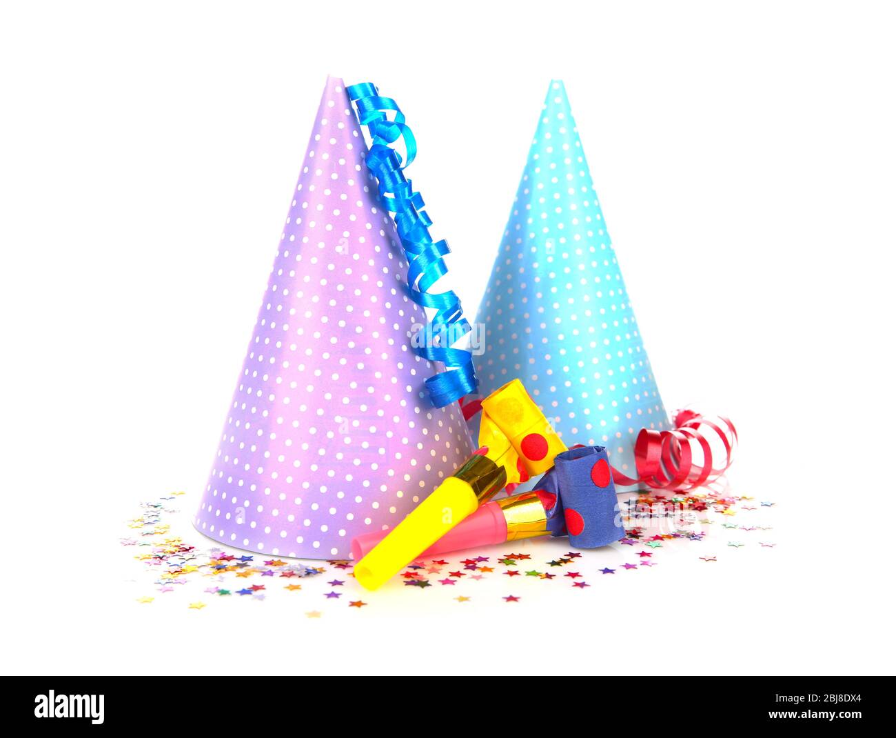 Party hats with blowers, isolated on white Stock Photo - Alamy