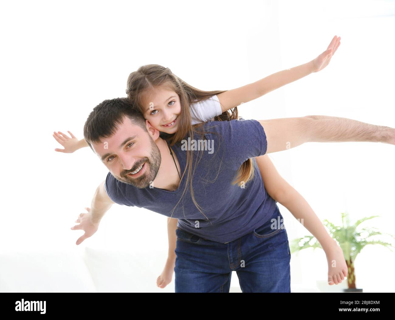 Father and daughter having fun together Stock Photo - Alamy