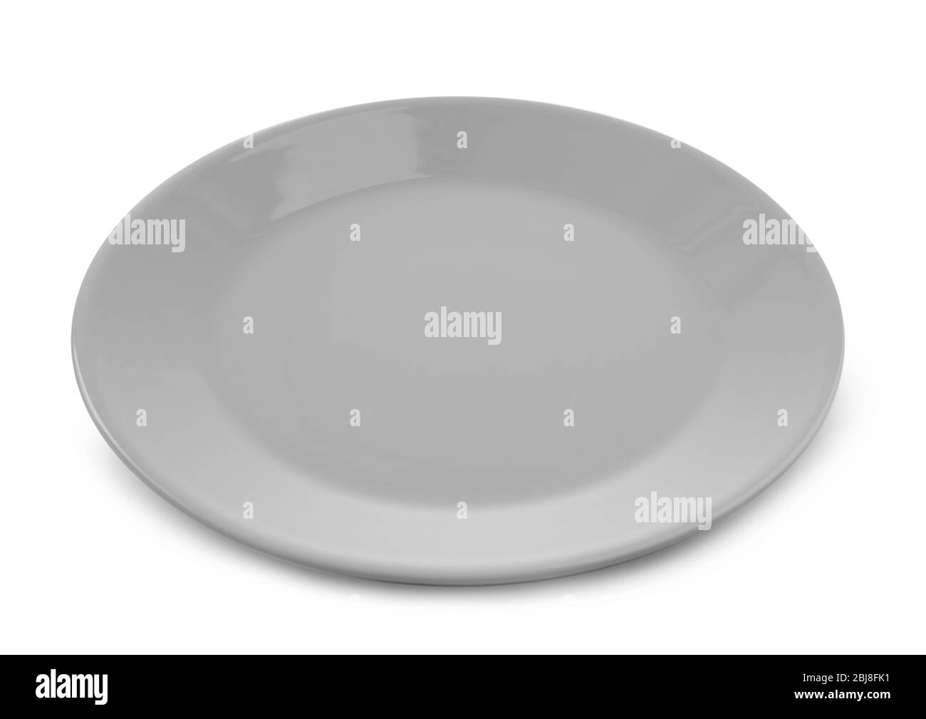 Round ceramic plate, isolated on white Stock Photo Alamy