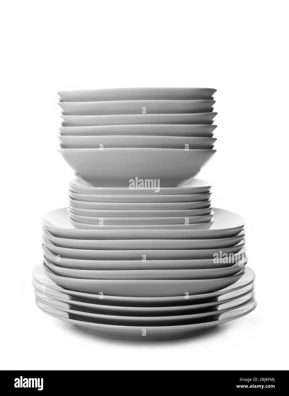 Stack of different ceramic plates, isolated on white Stock Photo Alamy