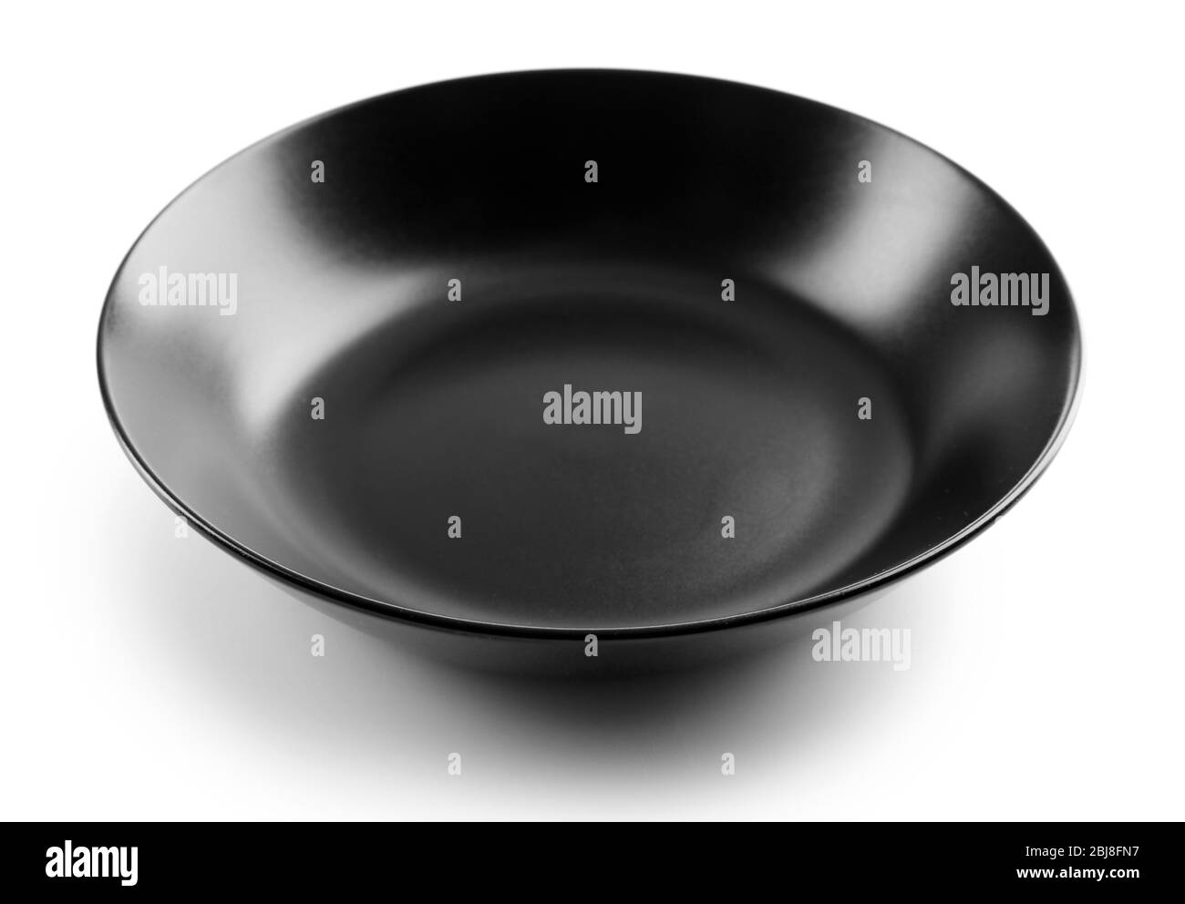 Black ceramic soup plate, isolated on white Stock Photo Alamy