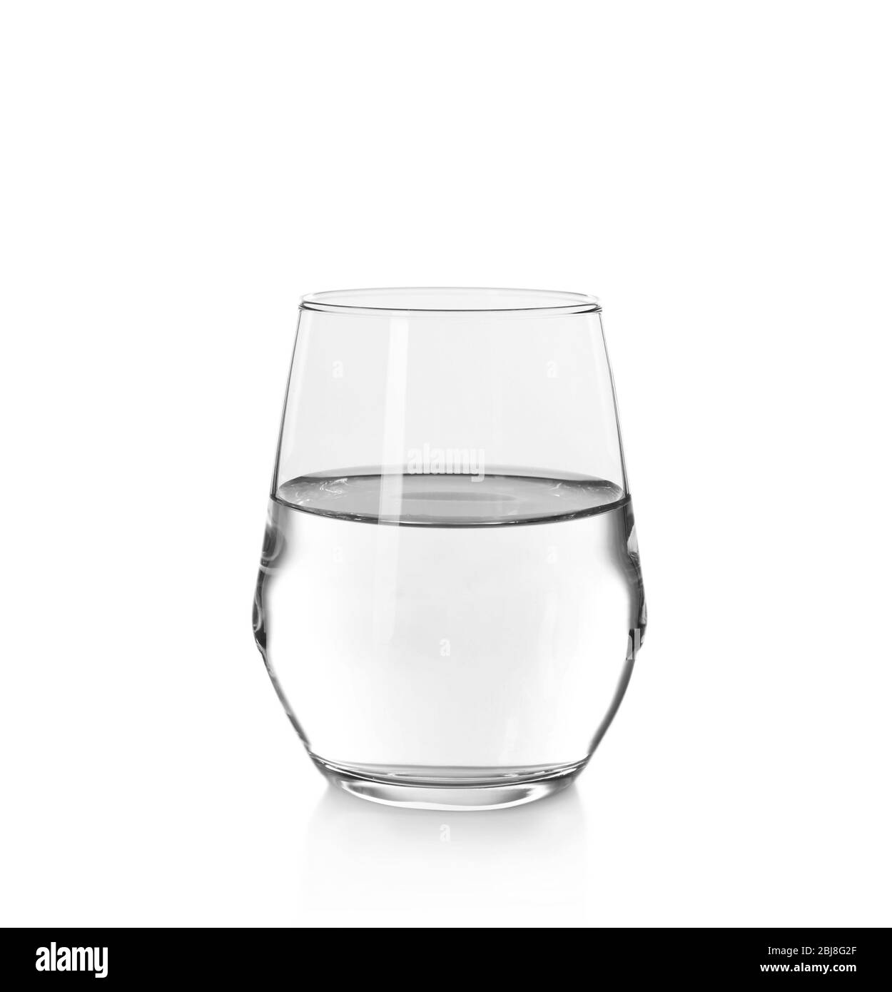 Glass of water on the white background, close up Stock Photo