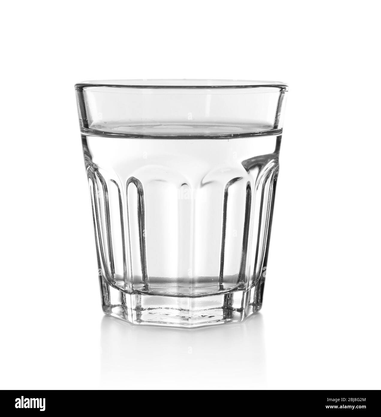 Glass of water on the white background, close up Stock Photo