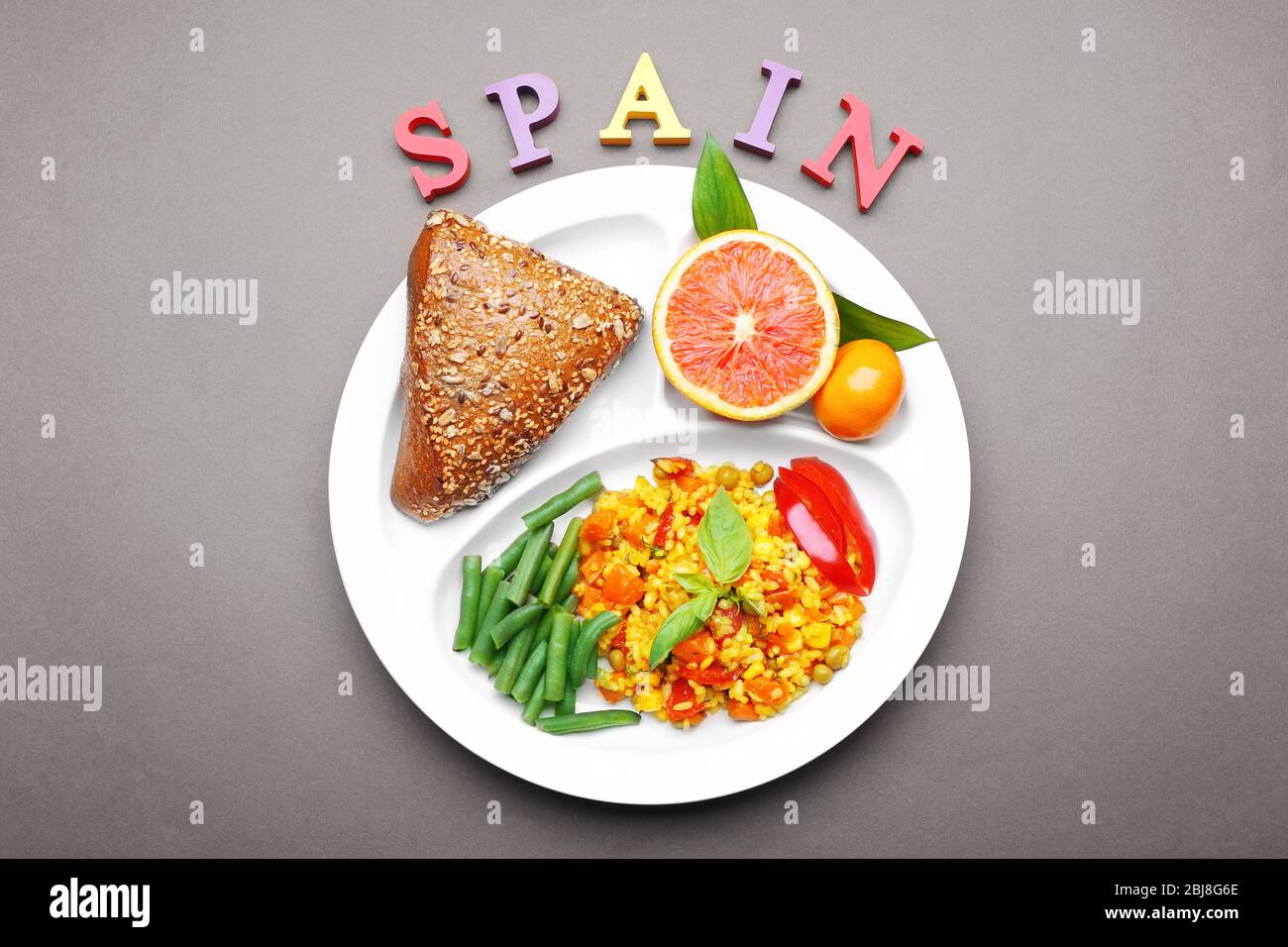 Traditional Spanish lunch on brown background Stock Photo