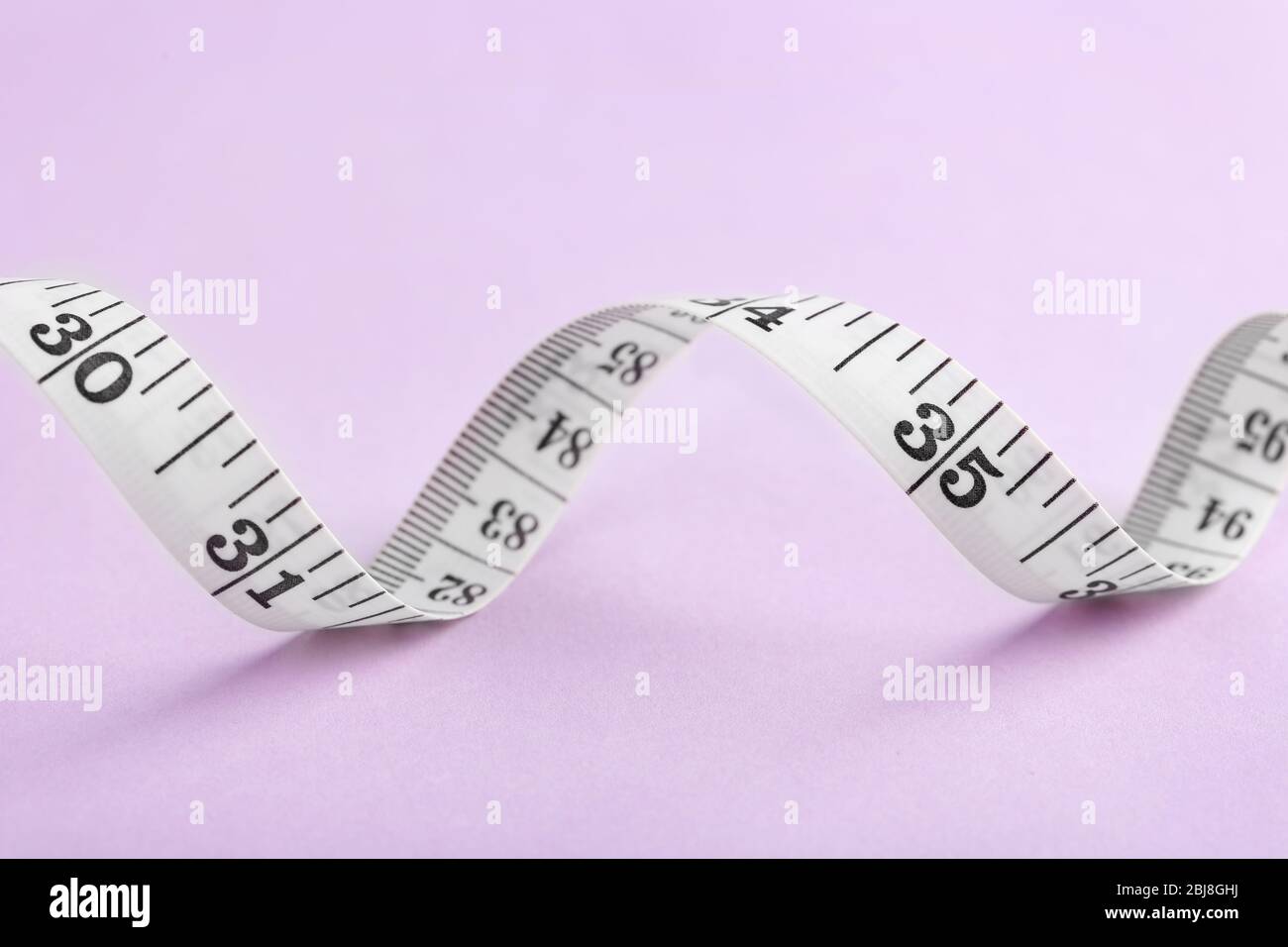 Purple tape measure hi-res stock photography and images - Alamy