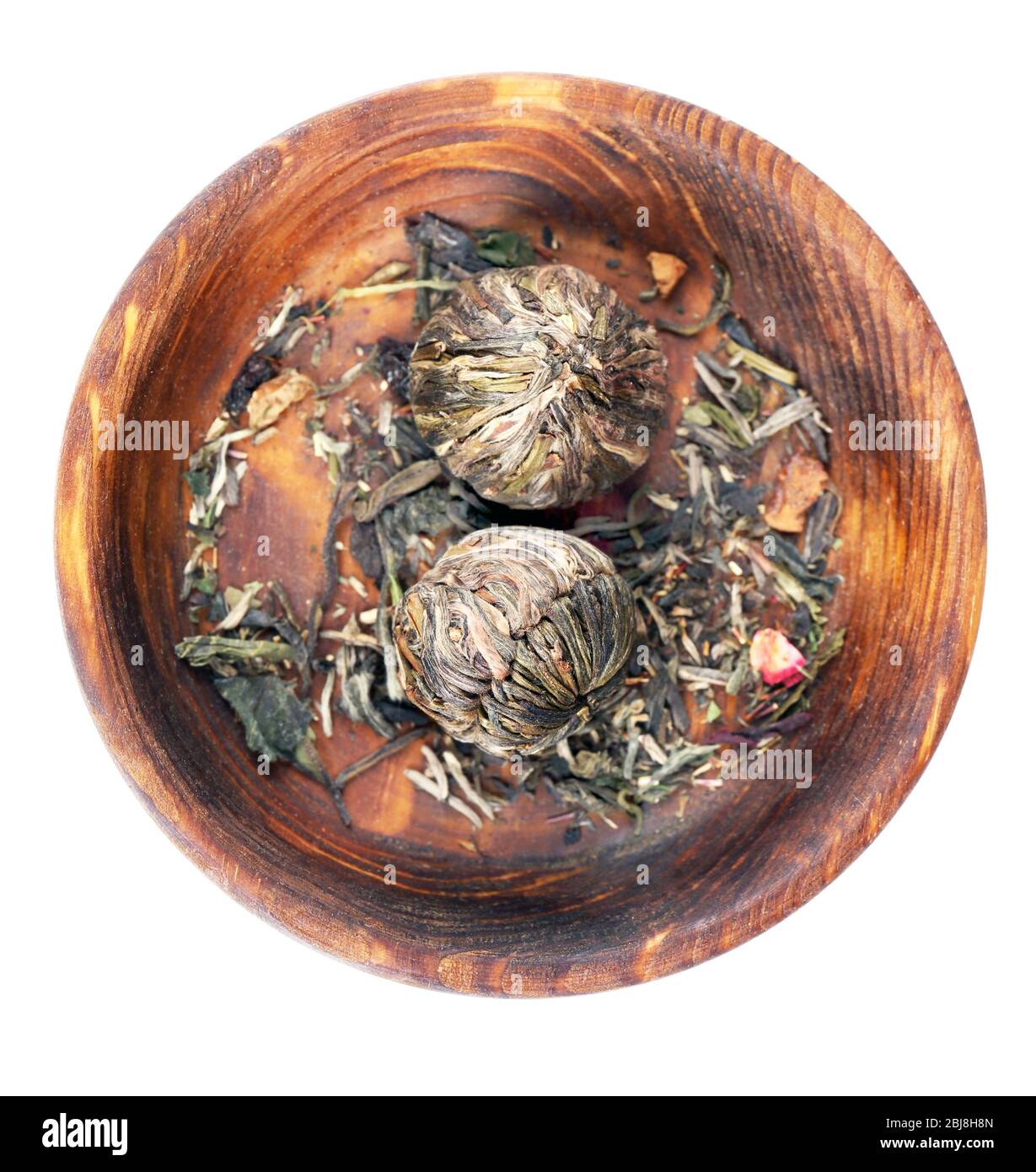 Dry tea in saucer isolated on white Stock Photo Alamy