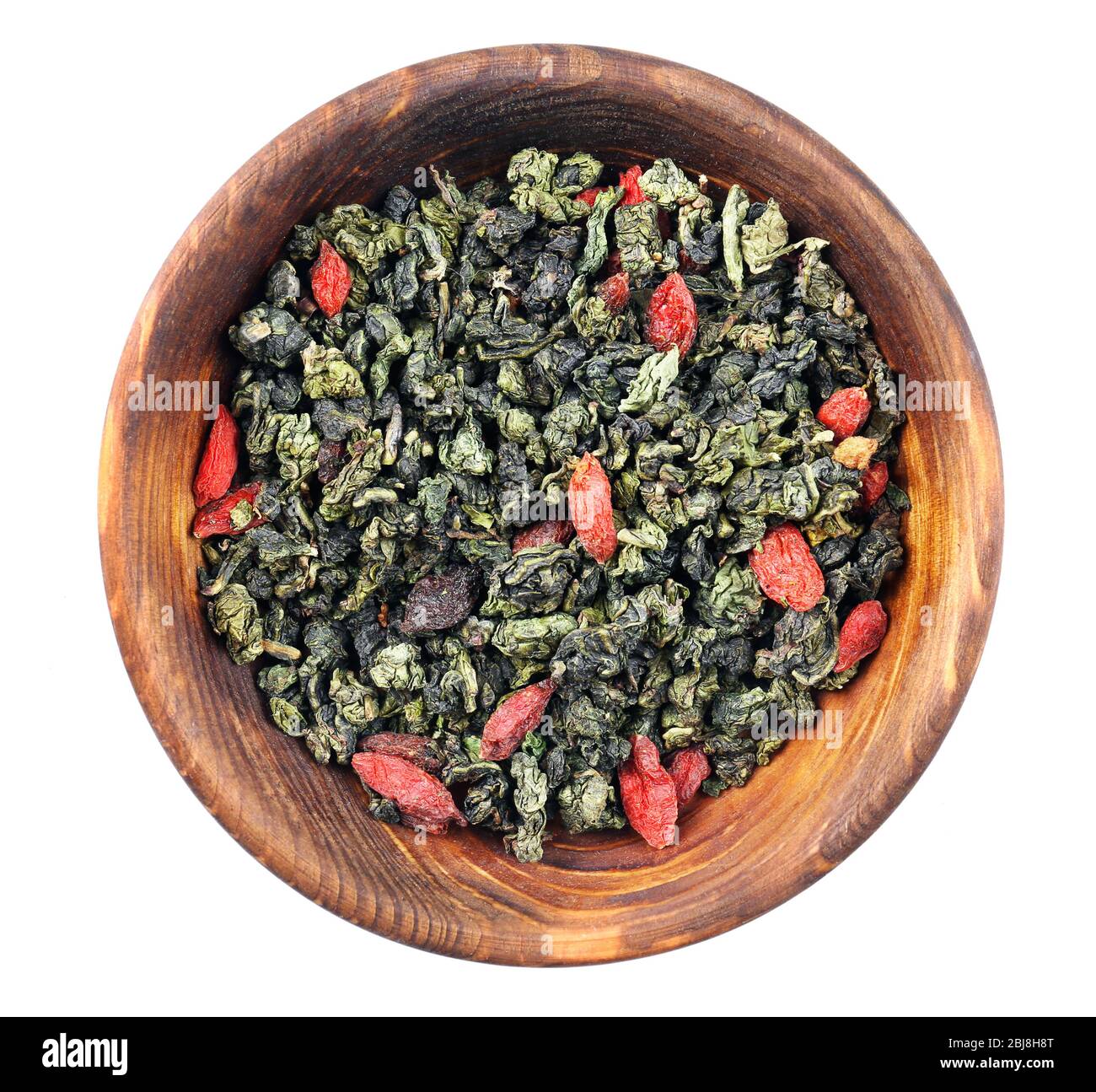 Dry tea in saucer isolated on white Stock Photo Alamy