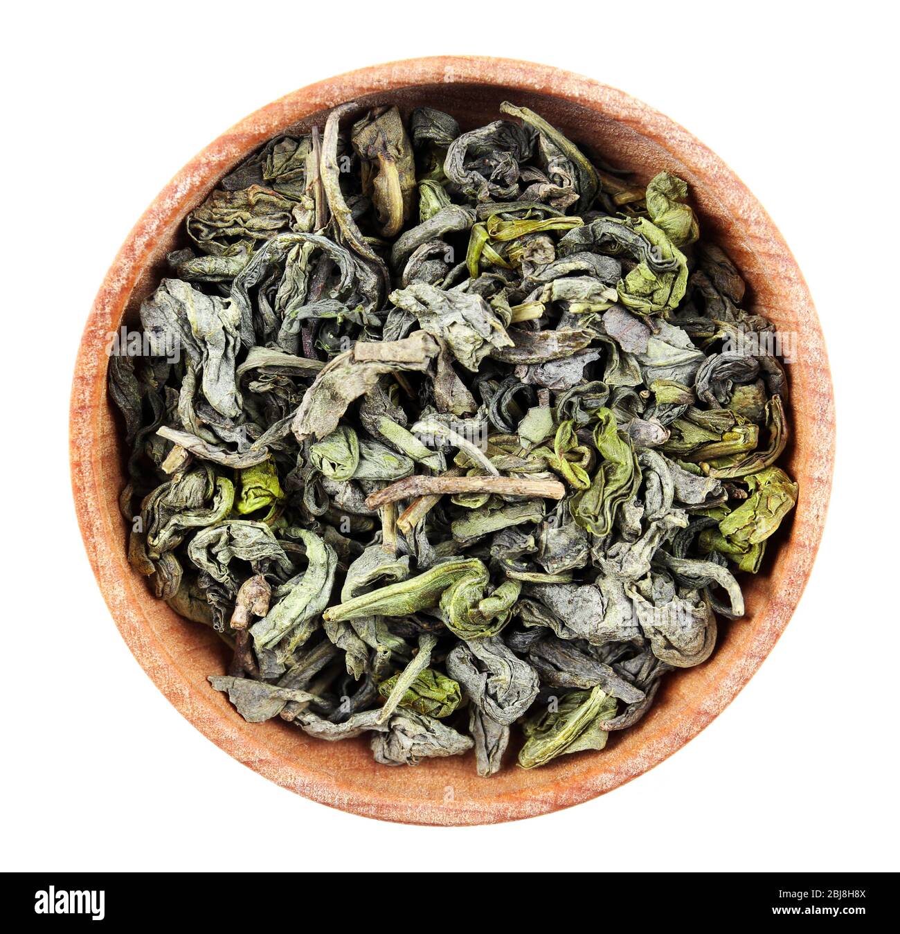 Dry tea in saucer isolated on white Stock Photo Alamy