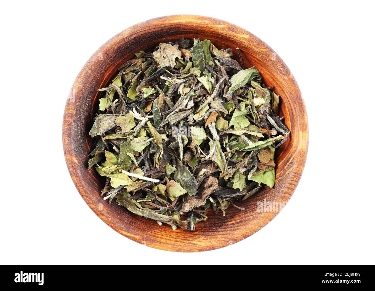 Dry tea in saucer isolated on white Stock Photo Alamy