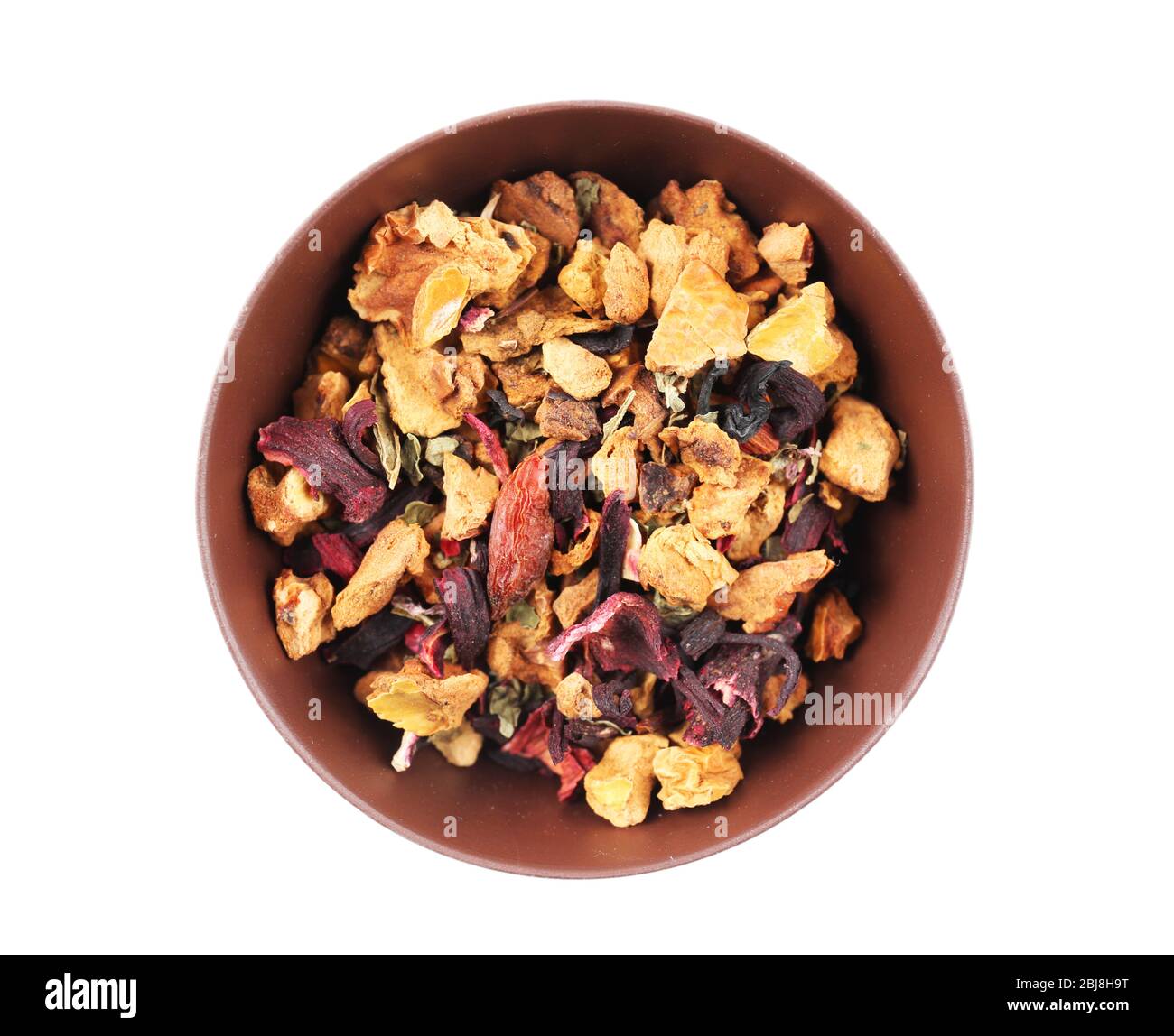 Dry tea in saucer isolated on white Stock Photo Alamy