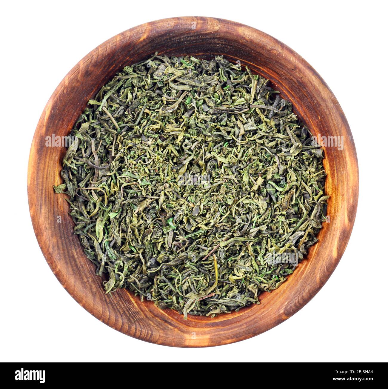 Dry tea in saucer isolated on white Stock Photo Alamy