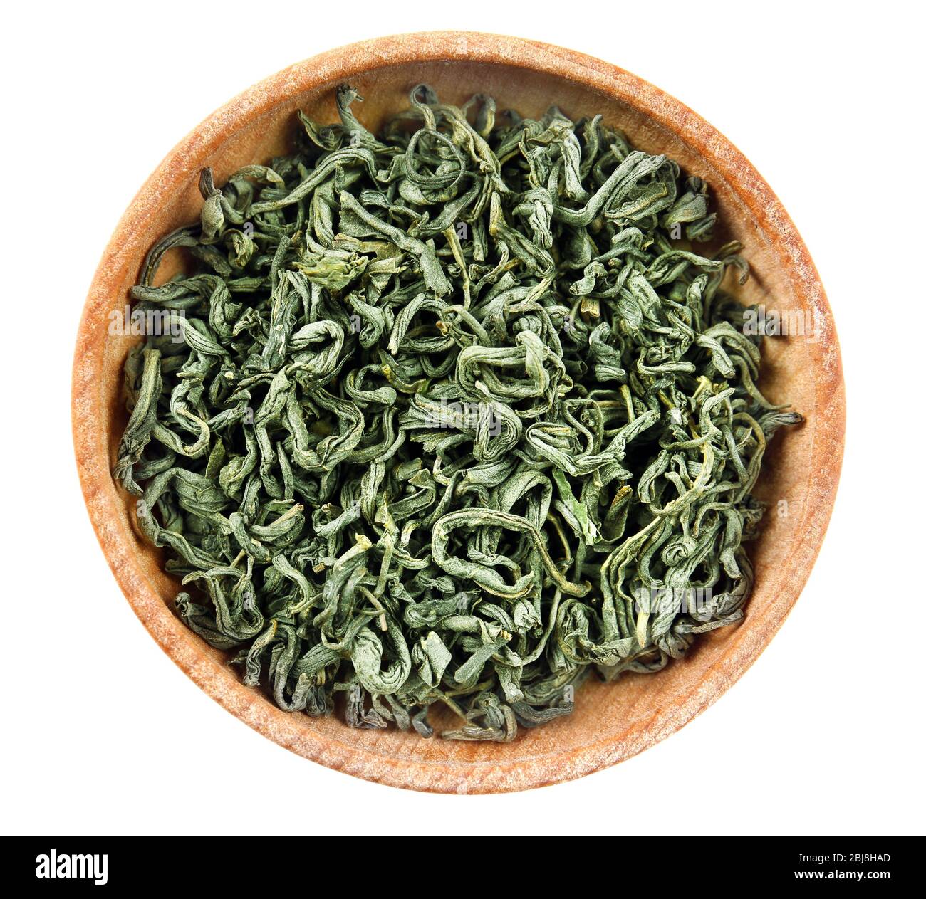 Dry tea in saucer isolated on white Stock Photo Alamy