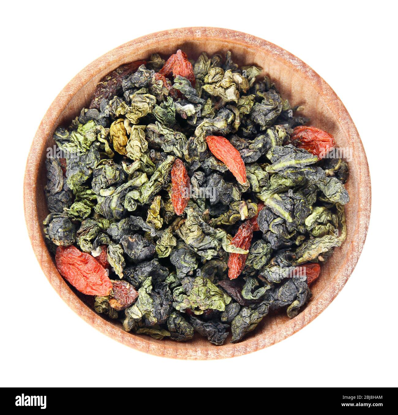 Dry tea in saucer isolated on white Stock Photo Alamy