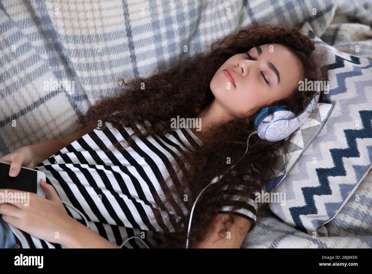 Beautiful girl sleeping on couch Stock Photo Alamy