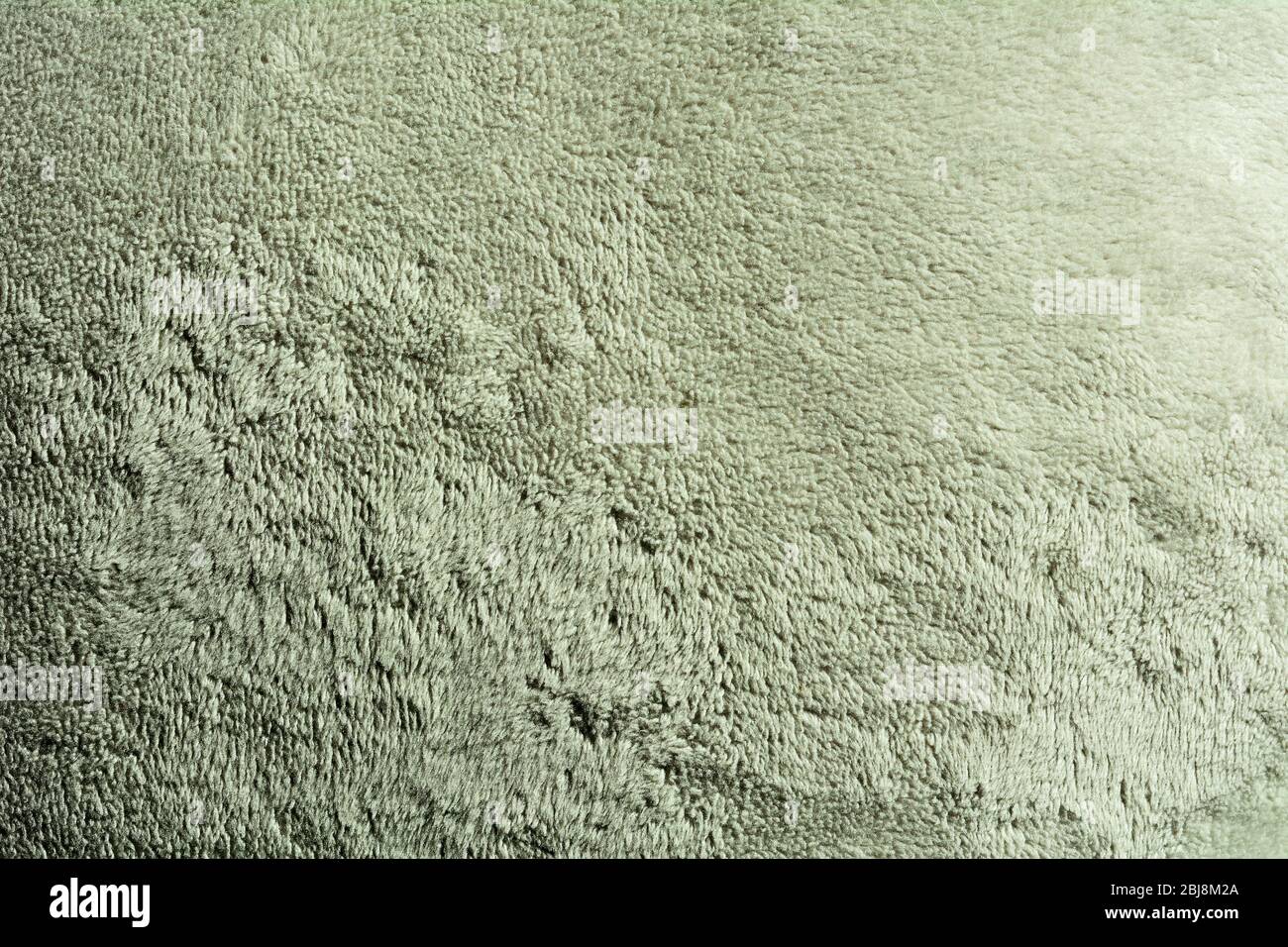 Full frame background of green suede surface Stock Photo - Alamy