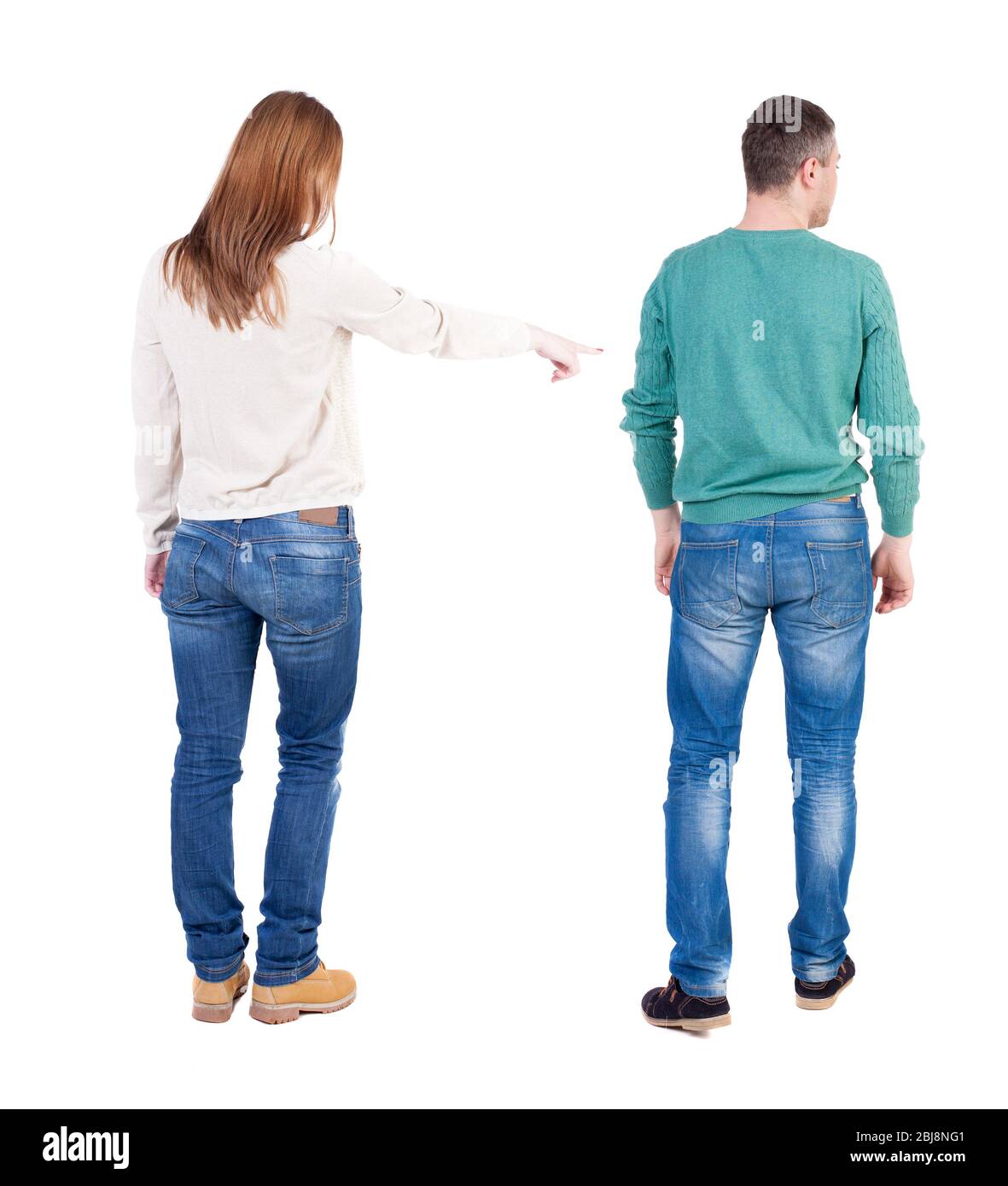 Back view of couple in sweater pointing. Rear view people collection ...
