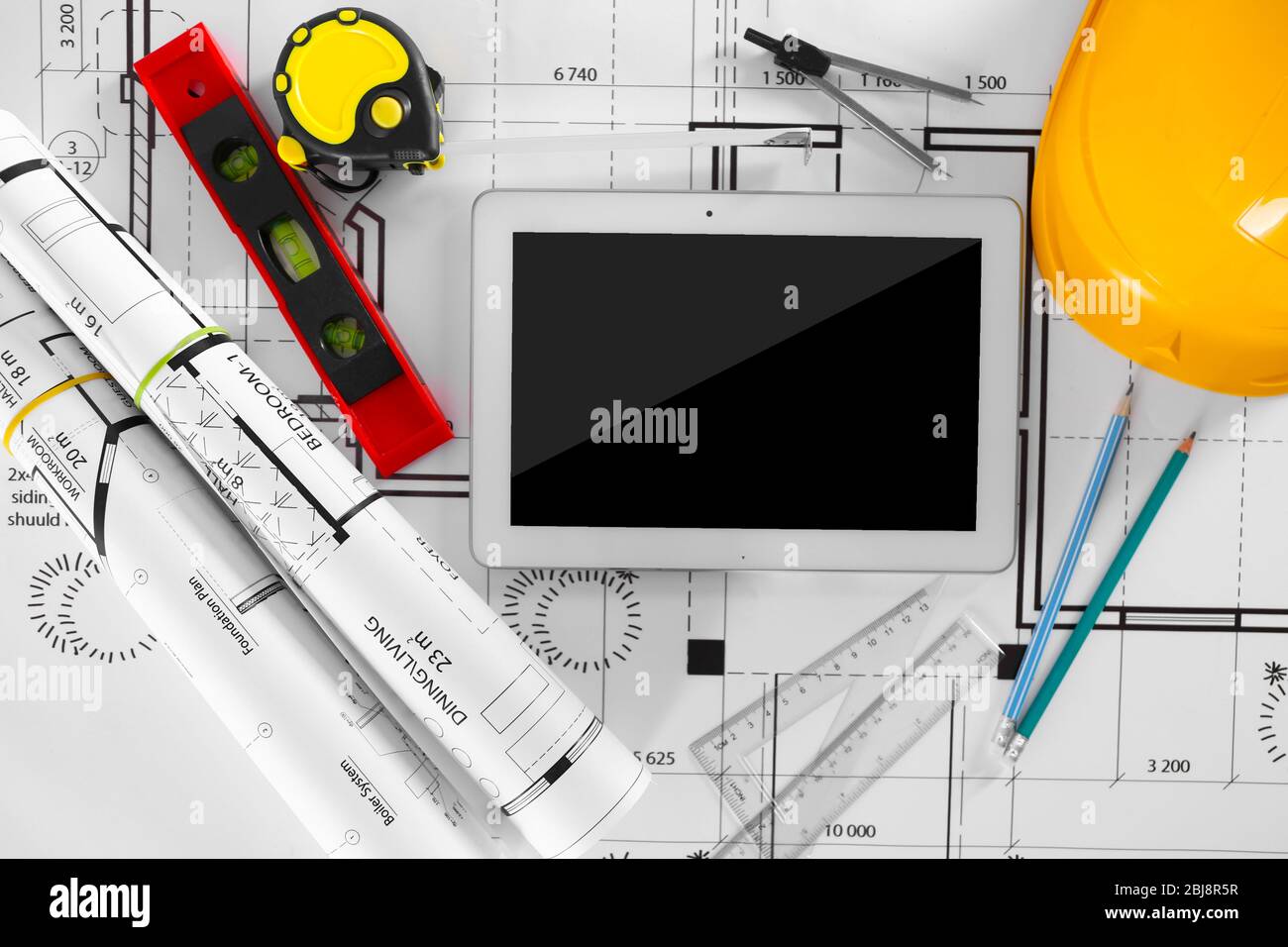 Construction blueprints with tools and tablet, top view Stock Photo