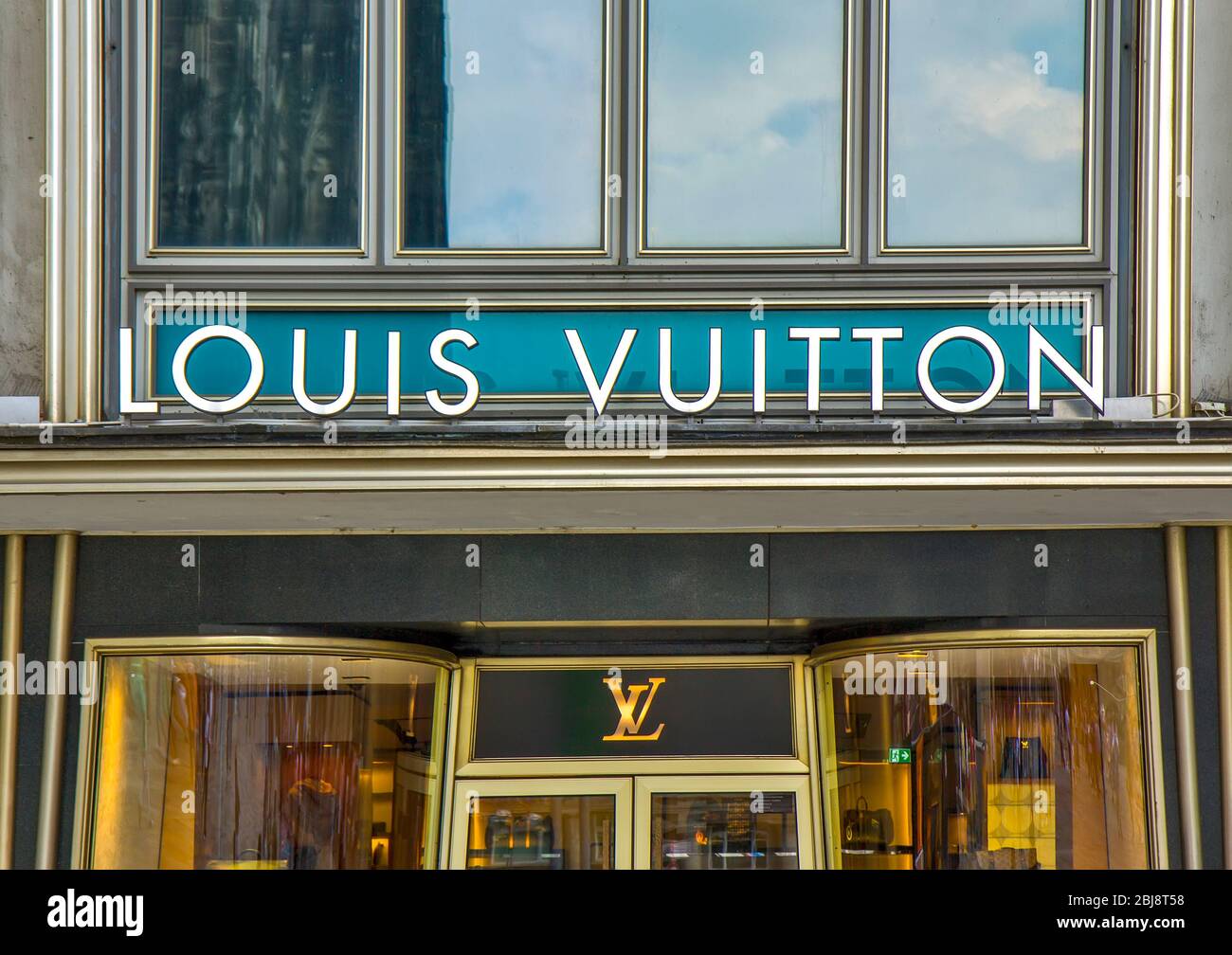 Louis Vuitton storefront in an upscale shopping district of Cologne  Germany. By contrast, the reflection of the Cologne Cathedral is visible in  the w Stock Photo - Alamy