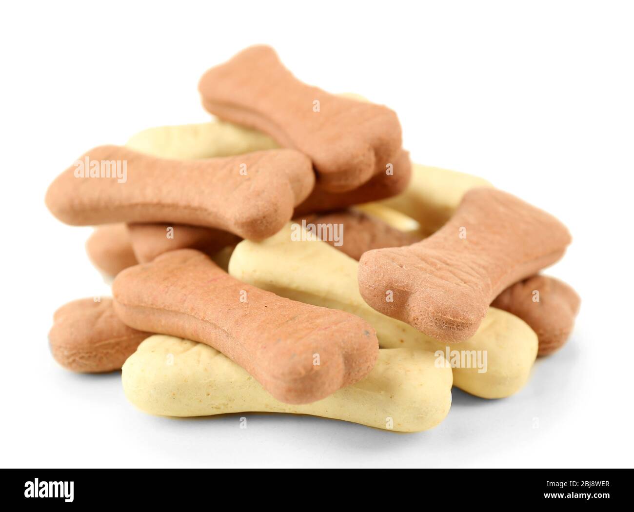 Pile of dog biscuit bones on white background Stock Photo Alamy