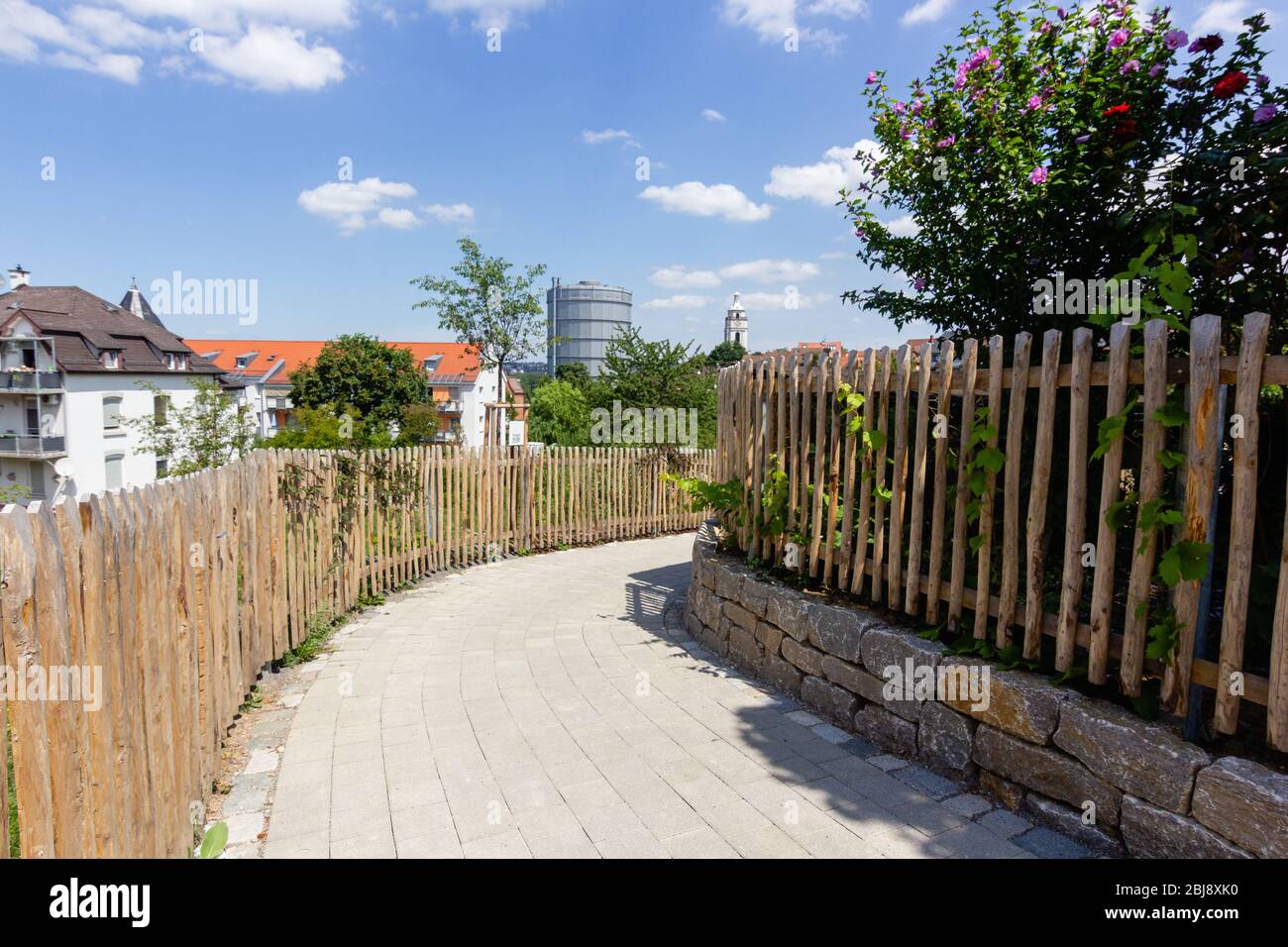 Stuttgart, Germany - July 2016: empty lane path with old german buildings of Gaisburg district in Stuttgart-Ost with view on Gaskessel Stuttgart tower Stock Photo