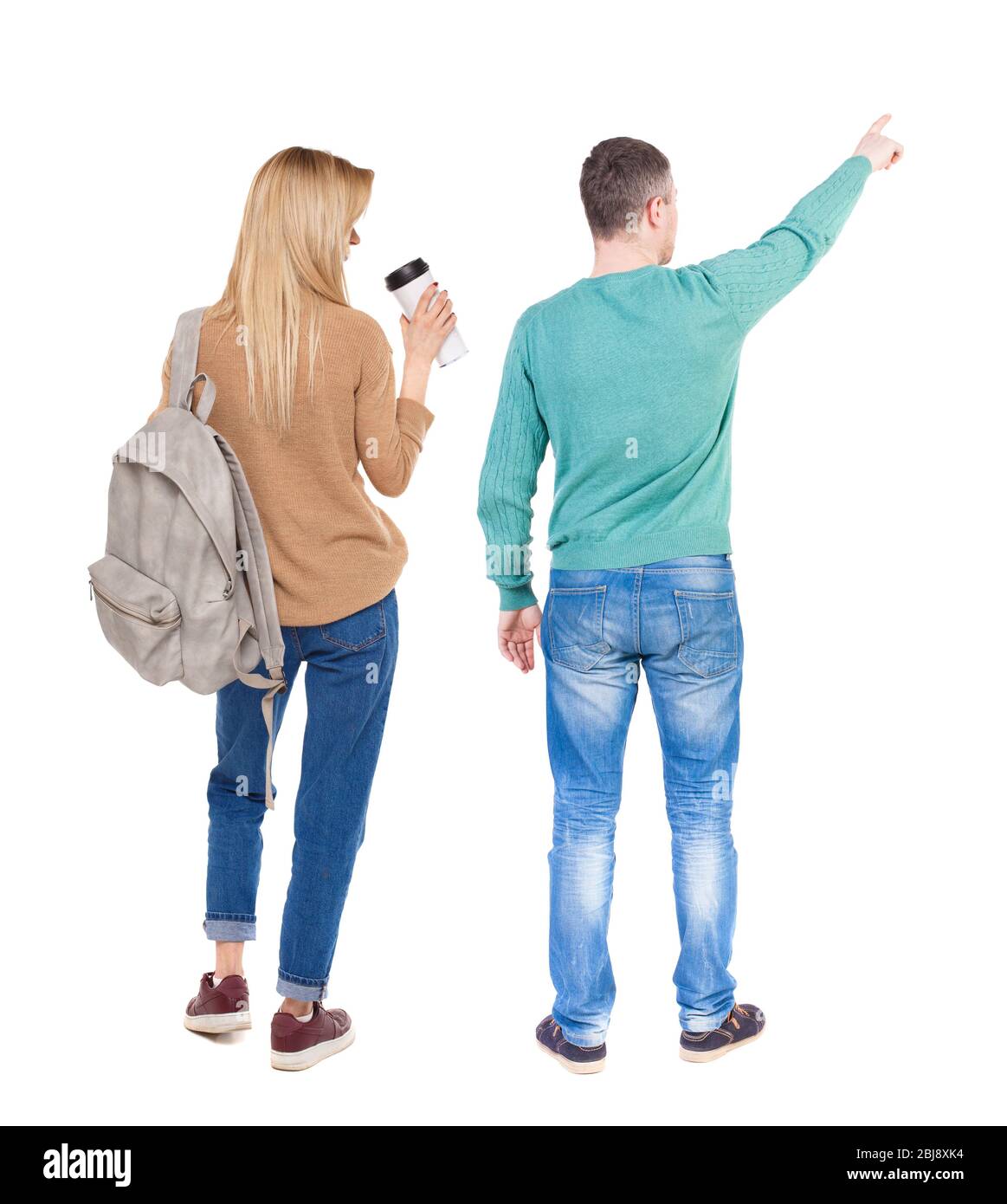 Back view of couple in sweater pointing. Rear view people collection ...