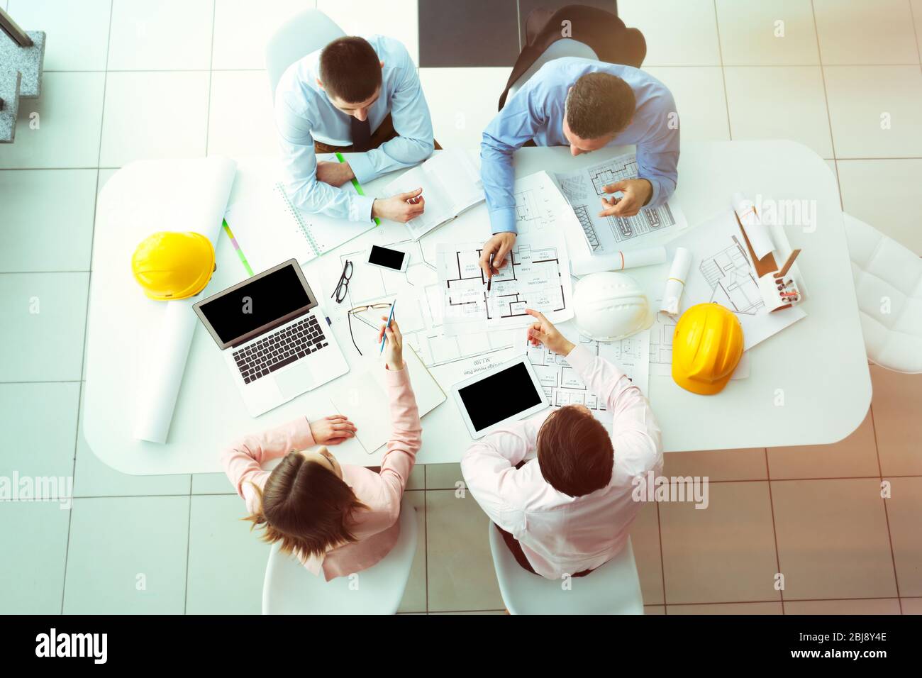 Young engineers working in the office, top view Stock Photo