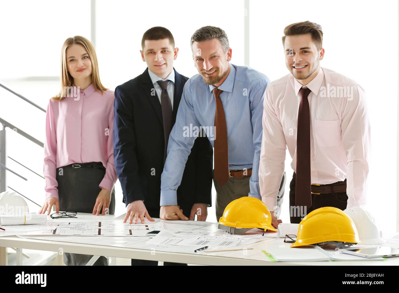 Group young engineers architects hi-res stock photography and images ...