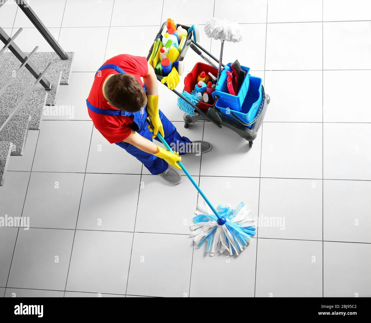 Man mopping floor, top view Stock Photo