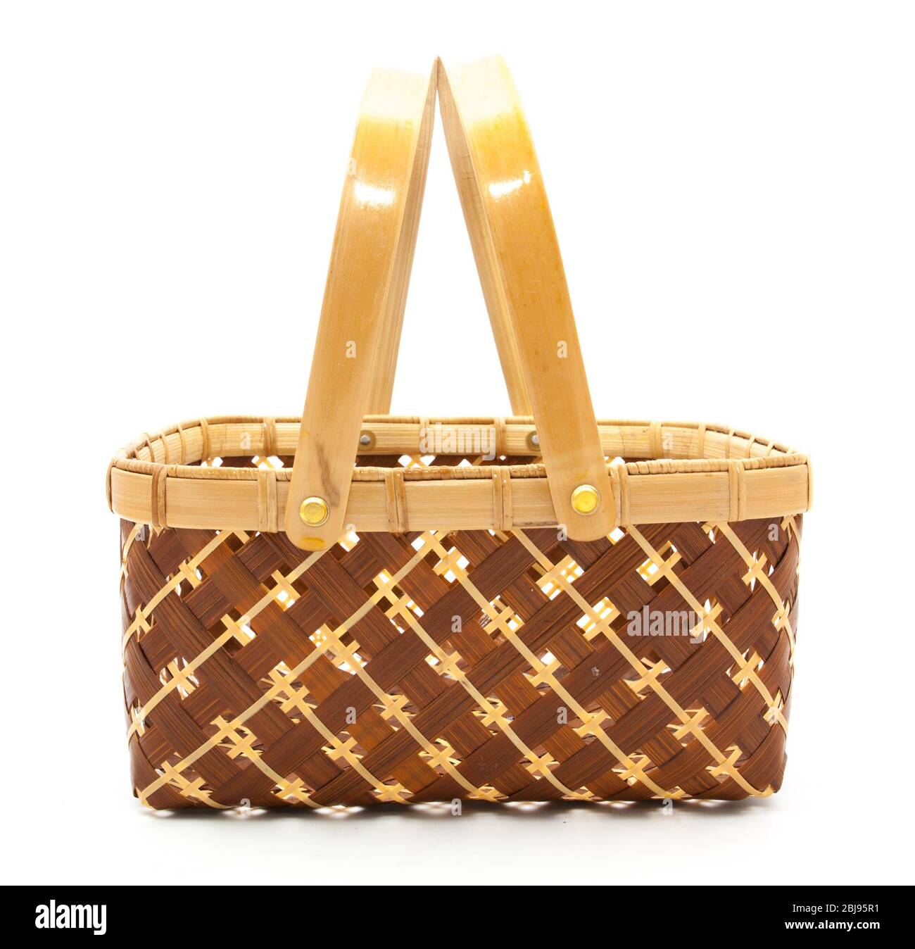 Empty wicker basket with handles isolated on white Stock Photo - Alamy