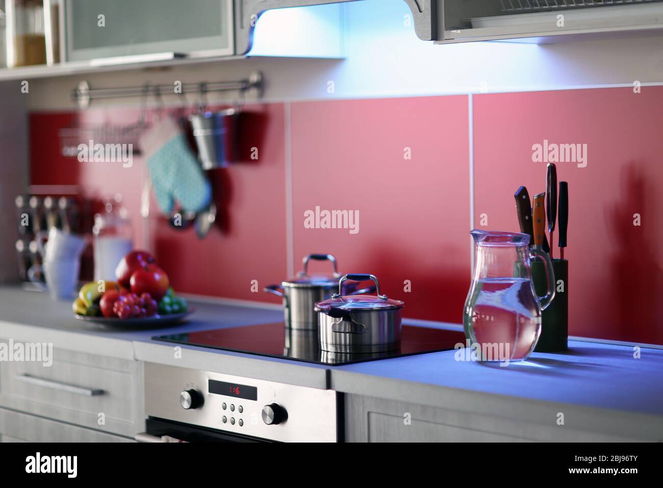 Modern kitchen interior with stove Stock Photo - Alamy