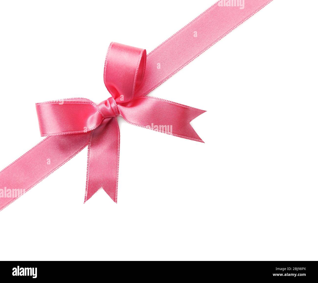 Pink ribbon bow on white background Stock Photo - Alamy