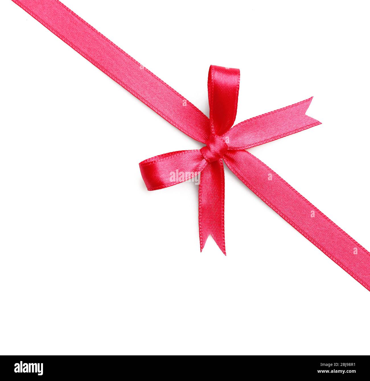 Pink ribbon bow on white background Stock Photo - Alamy