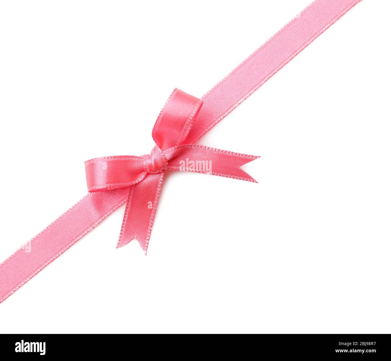 Pink ribbon bow on white background Stock Photo - Alamy