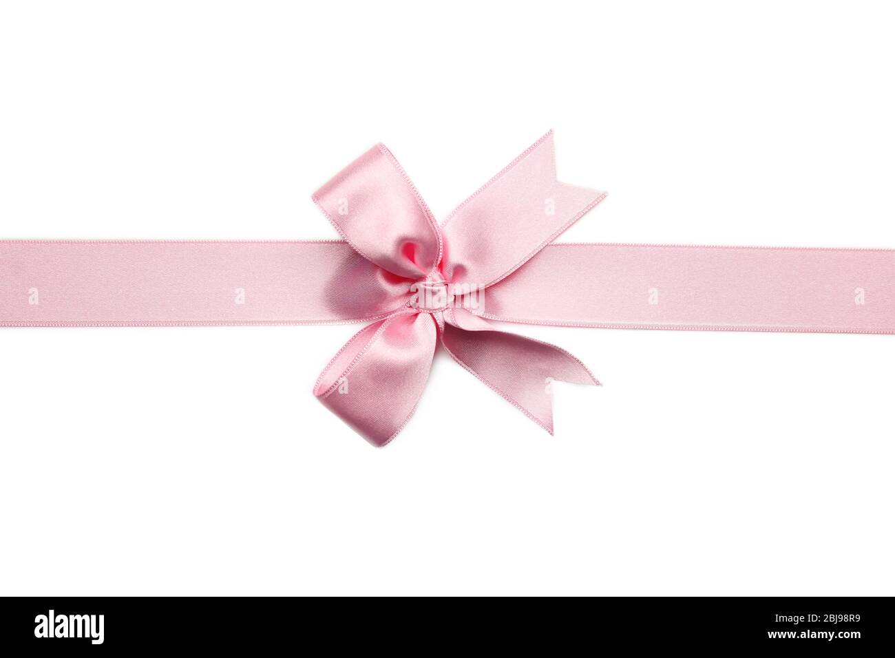Pink ribbon bow on white background Stock Photo - Alamy