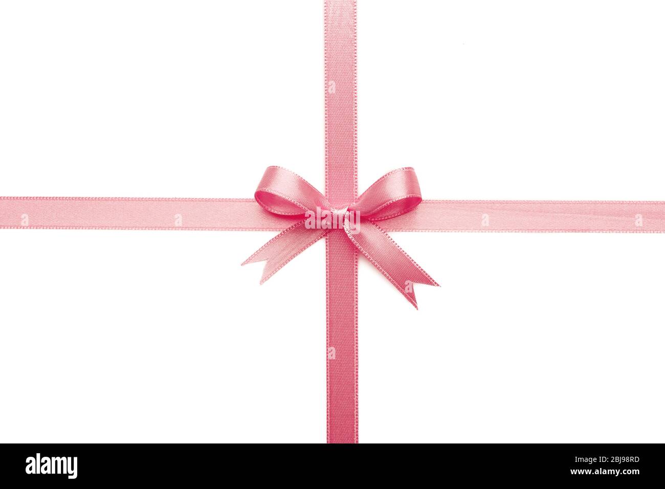 Pink ribbon bow on white background Stock Photo - Alamy